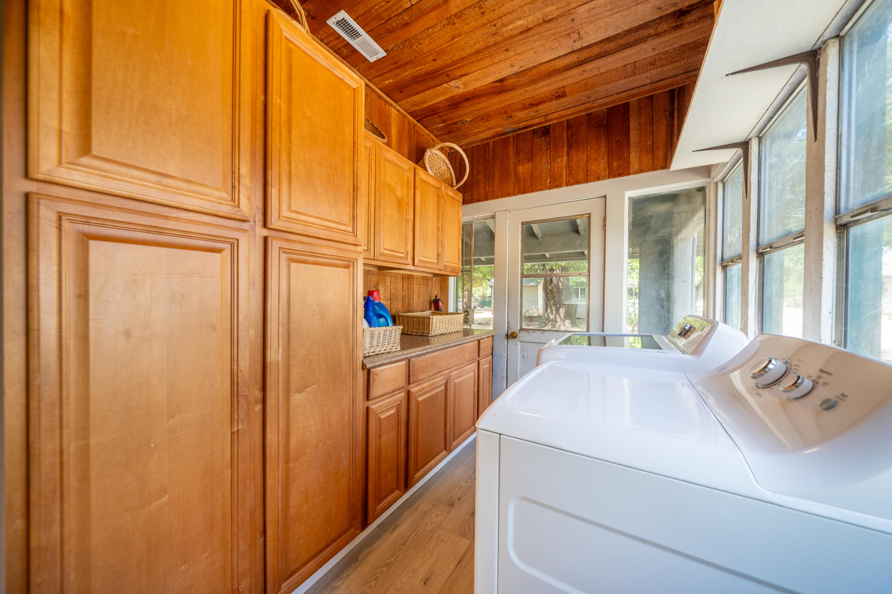 24294 Dersch Road Shingletown, CA 96088 - Photo 22 of 34 a utility room with dryer and washer