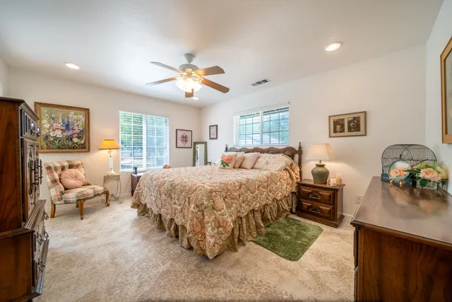 a bed room with a bed and a couch