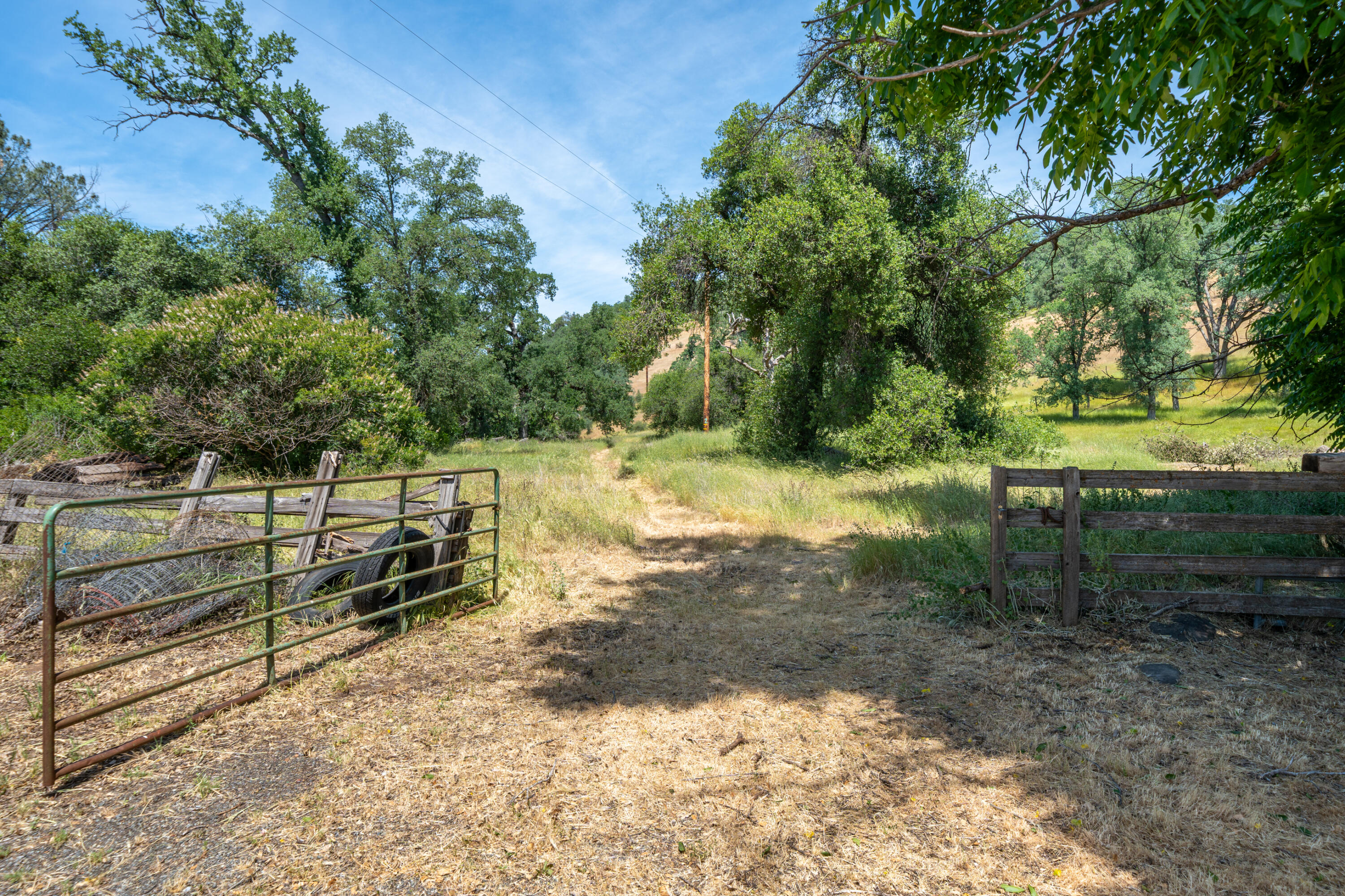 24294 Dersch Road Shingletown, CA 96088 - Photo 33 of 34 a view of a backyard with wooden fence