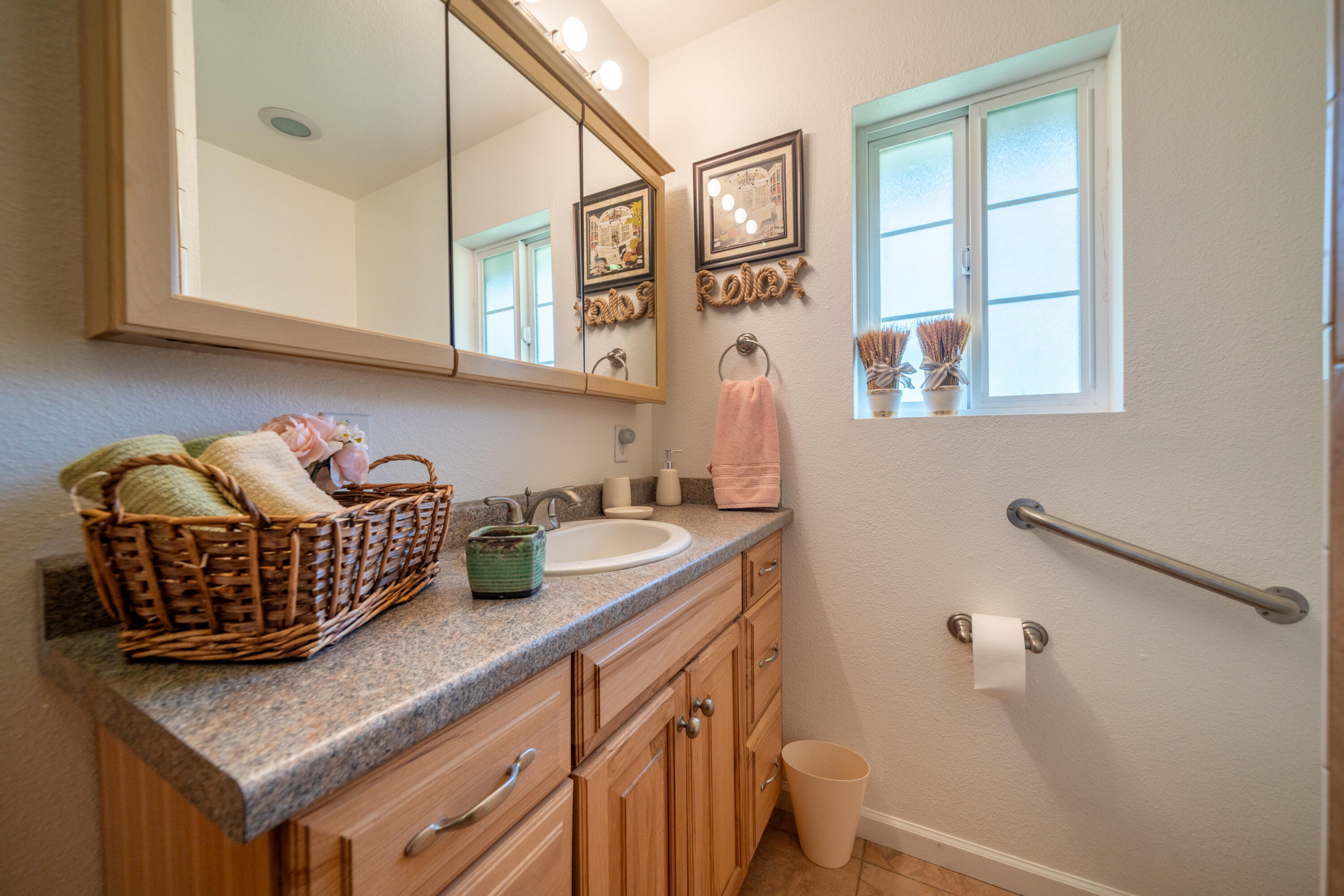 24294 Dersch Road Shingletown, CA 96088 - Photo 9 of 34 a kitchen with a sink a cabinets and window