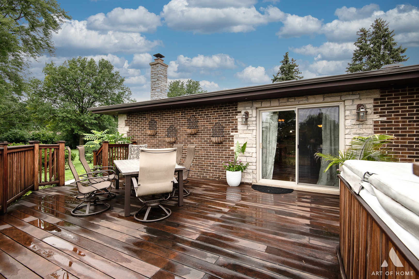 6N654 Harvey Road Medinah, IL 60172 - Photo 9 of 47 a view of a patio with table and chairs and wooden floor