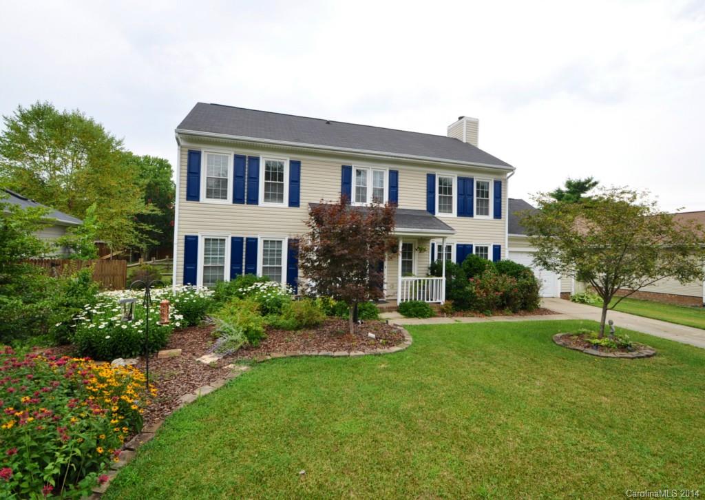 10336 Fairway Ridge Road Charlotte, NC 28277 - Photo 1 of 23 a front view of a house with a yard