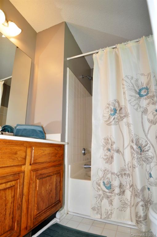 10336 Fairway Ridge Road Charlotte, NC 28277 - Photo 22 of 23 a bathroom with a bathtub and a shower