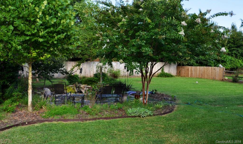 10336 Fairway Ridge Road Charlotte, NC 28277 - Photo 5 of 23 a view of a house with backyard and sitting area