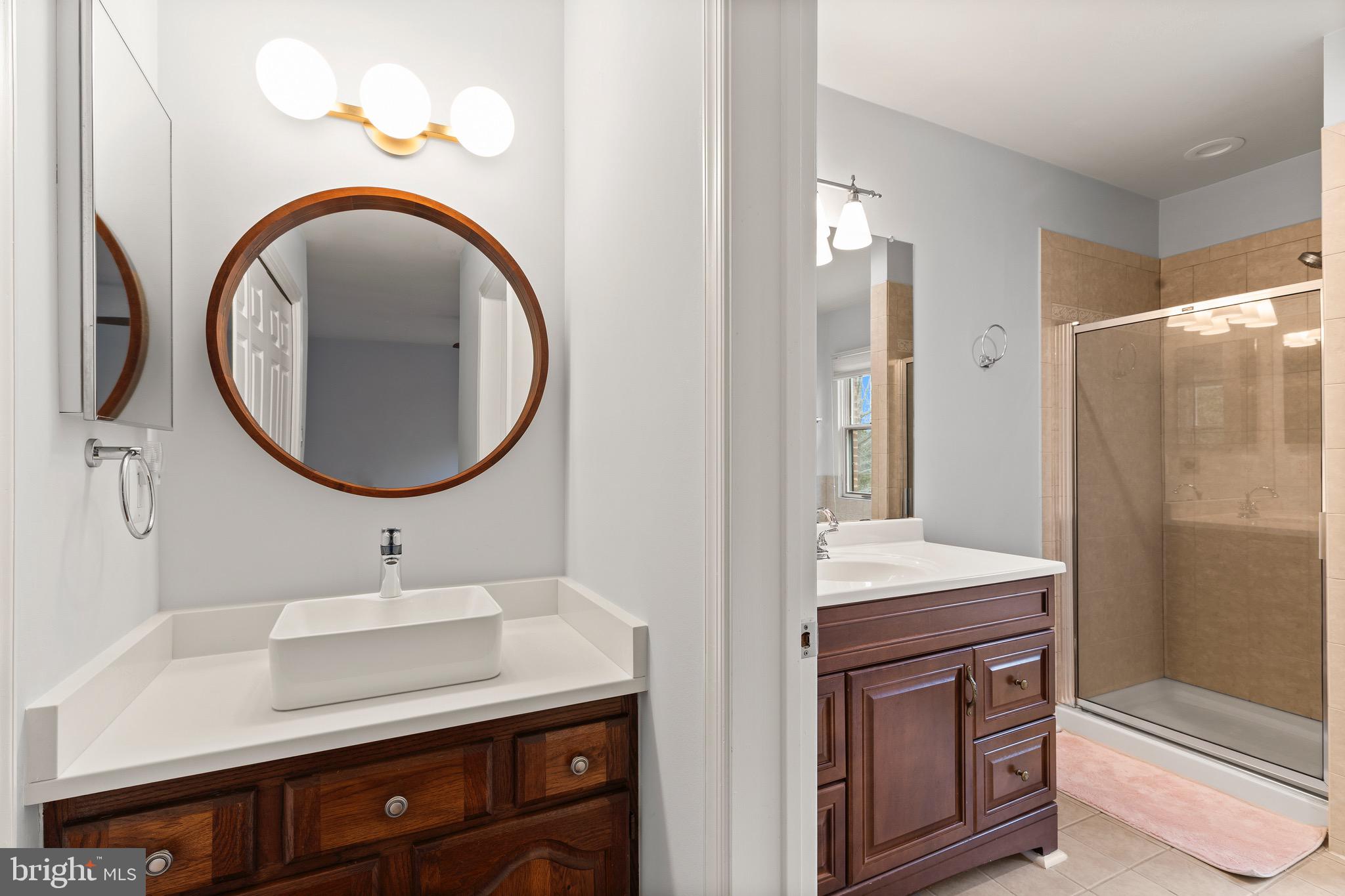 1474 Hampton Hill Circle McLean, VA 22101 - Photo 17 of 45 a bathroom with a sink and a mirror