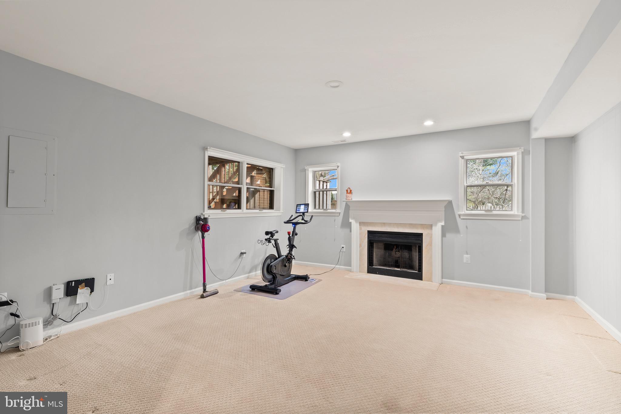 1474 Hampton Hill Circle McLean, VA 22101 - Photo 25 of 45 a view of a livingroom with a fireplace and window