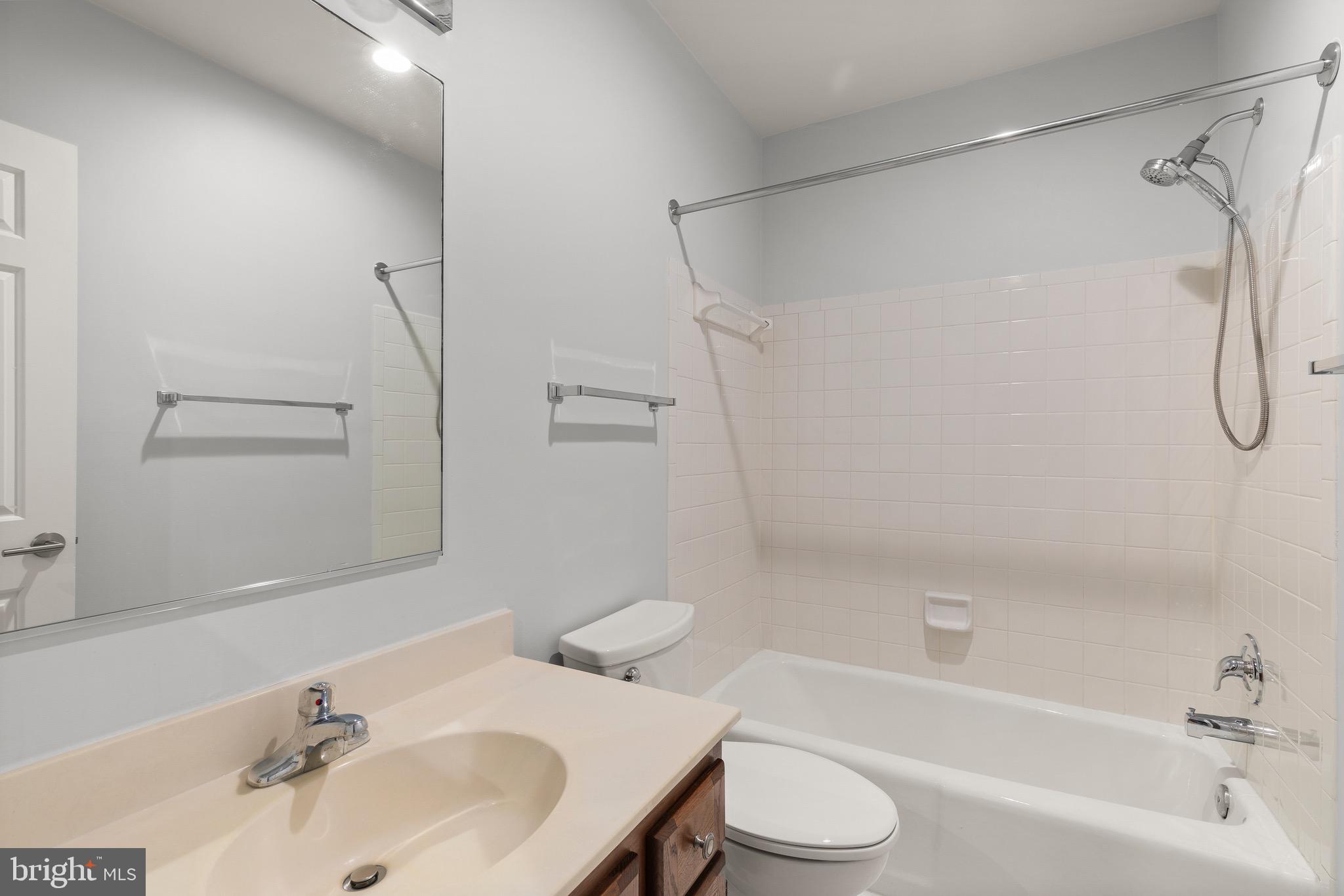 1474 Hampton Hill Circle McLean, VA 22101 - Photo 26 of 45 a bathroom with a sink toilet and shower