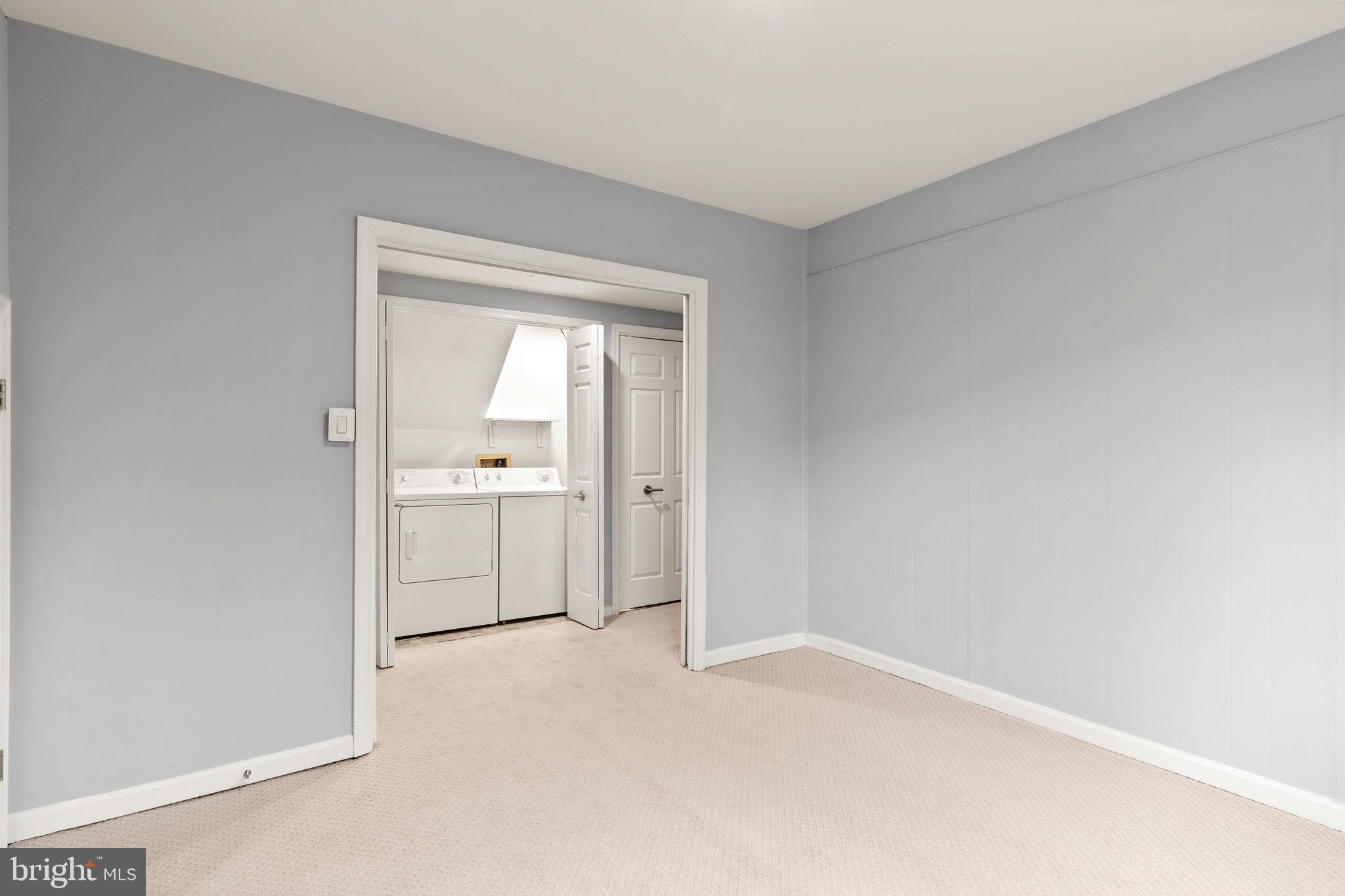 1474 Hampton Hill Circle McLean, VA 22101 - Photo 29 of 45 a bathroom with a bathtub sink and mirror