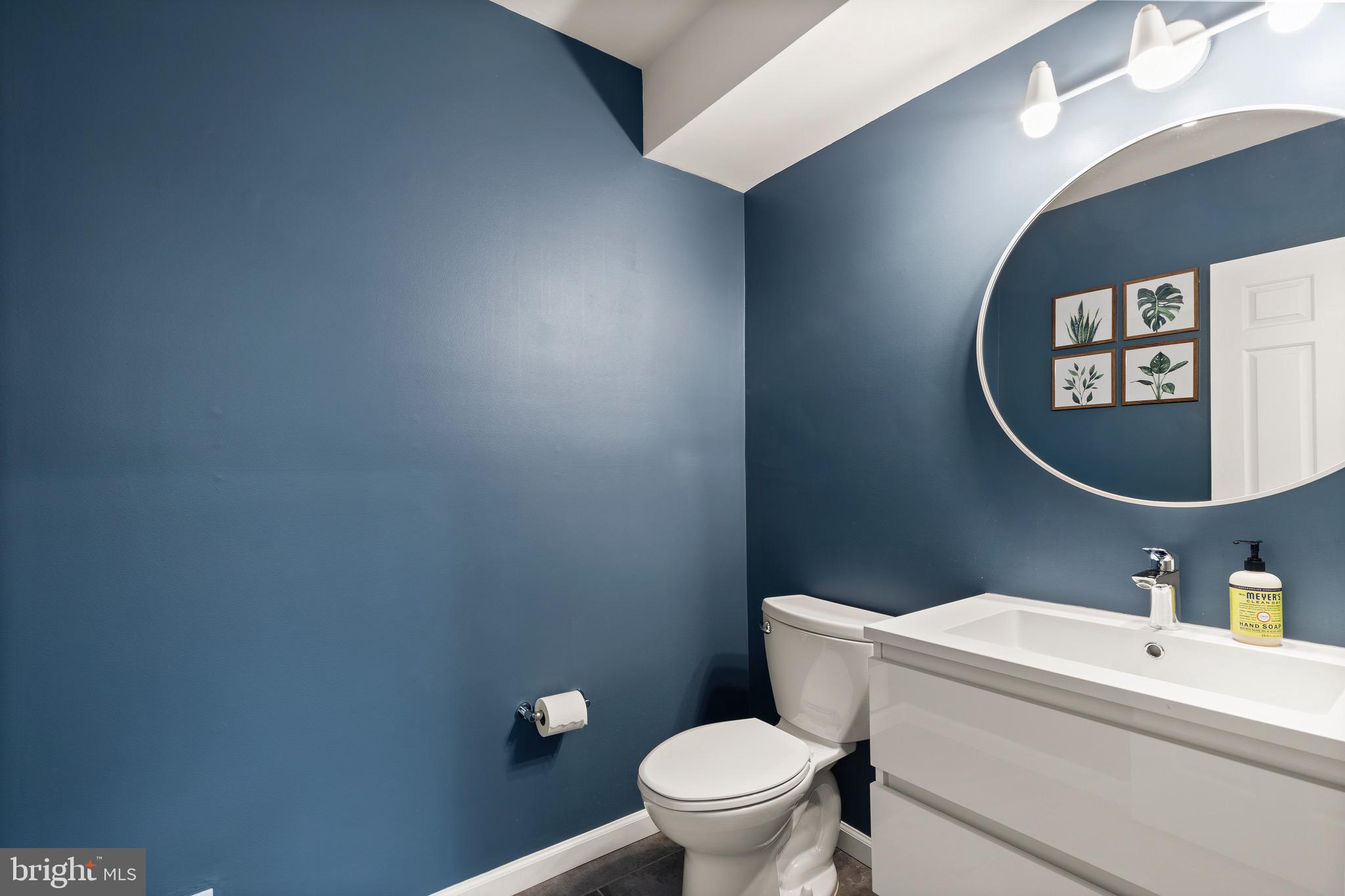 1474 Hampton Hill Circle McLean, VA 22101 - Photo 32 of 45 a bathroom with a toilet and a mirror