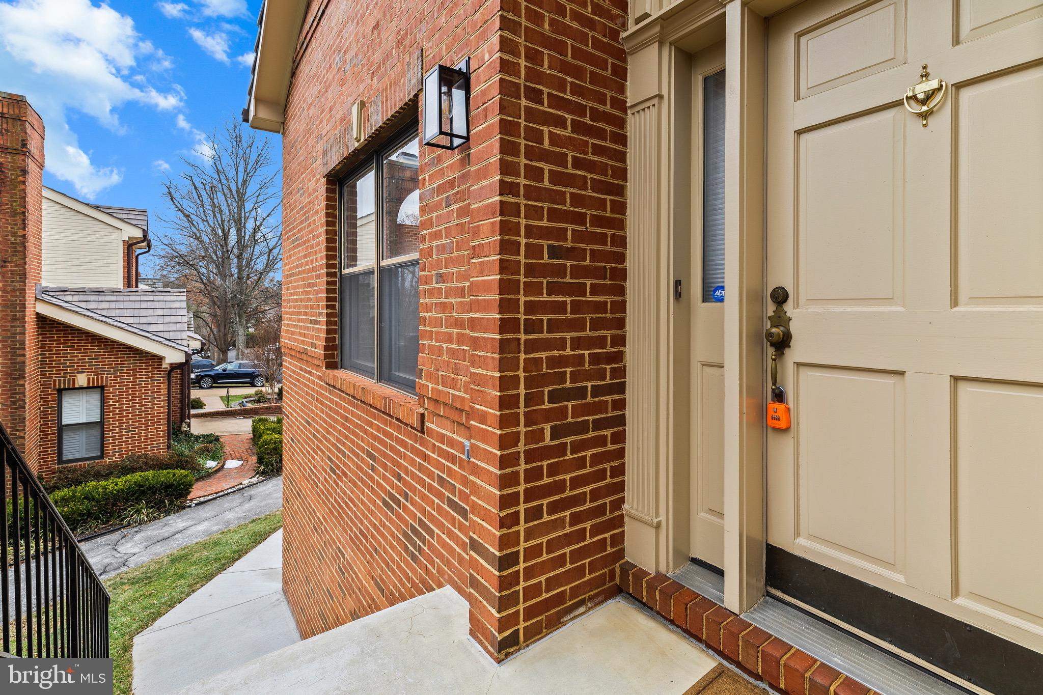 1474 Hampton Hill Circle McLean, VA 22101 - Photo 36 of 45 a view of a brick house with many windows