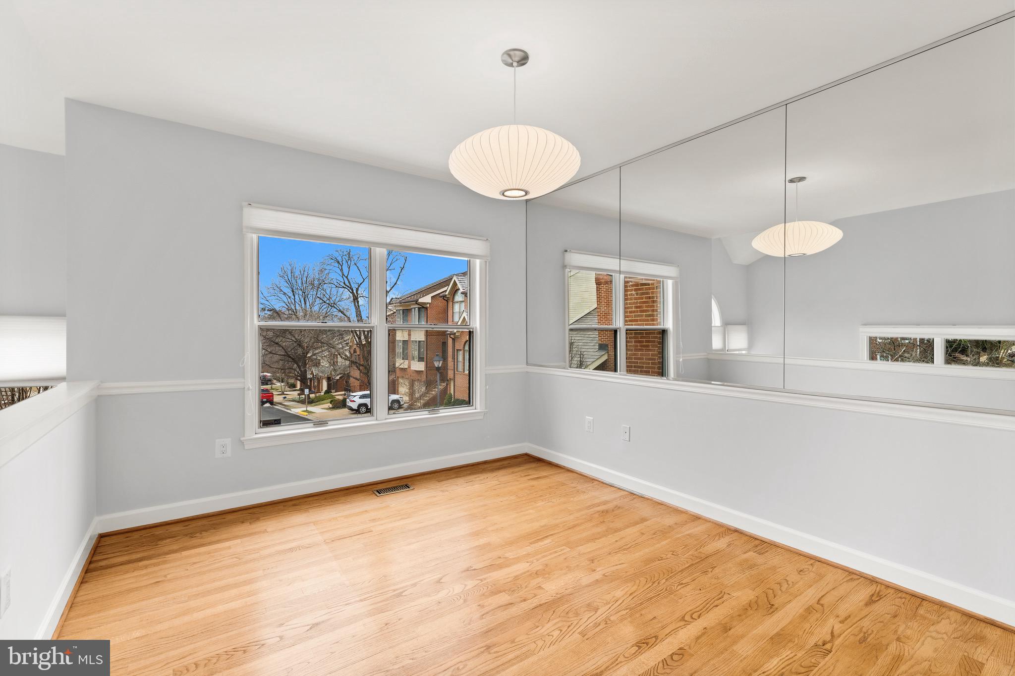 1474 Hampton Hill Circle McLean, VA 22101 - Photo 5 of 45 a view of an empty room with a window