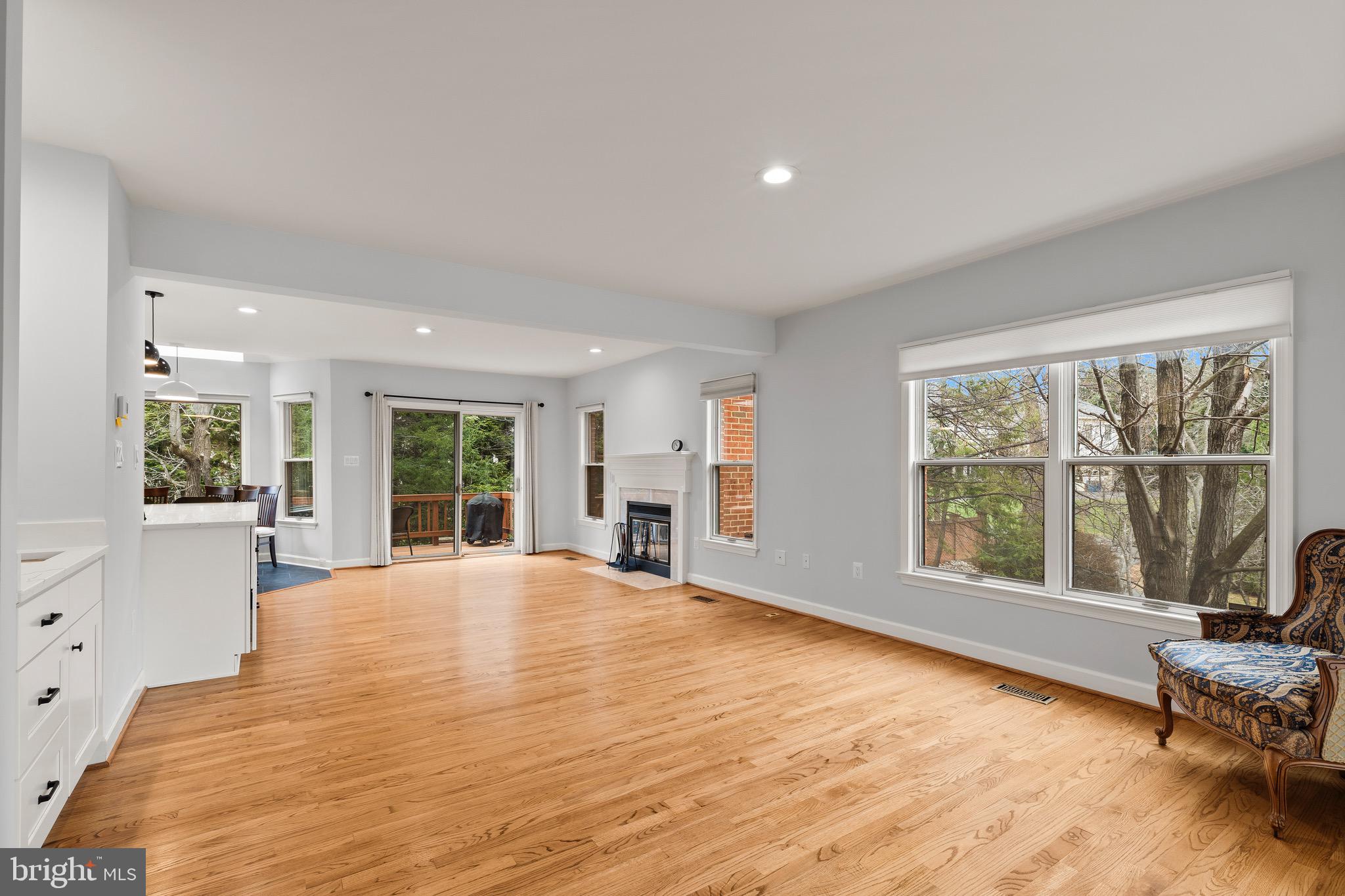 1474 Hampton Hill Circle McLean, VA 22101 - Photo 7 of 45 a view of an empty room with wooden floor and a window