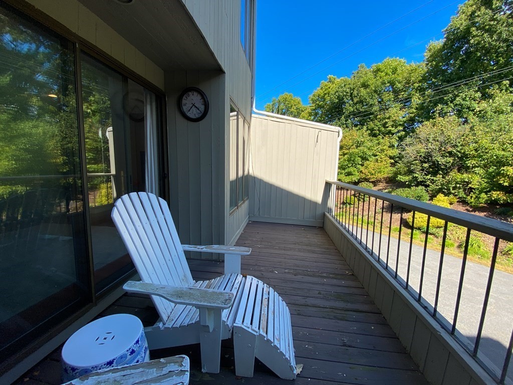 4 Mill Pond, Unit 4 North Andover, MA 01845 - Photo 2 of 6 a view of balcony with two chairs and a table