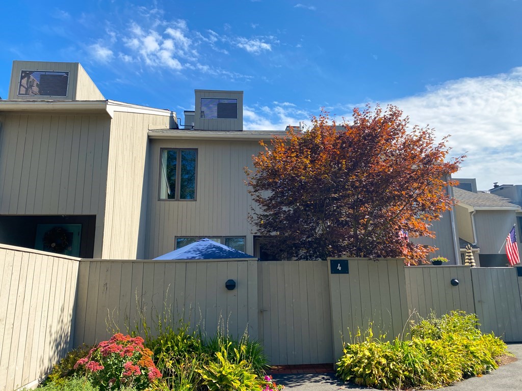 4 Mill Pond, Unit 4 North Andover, MA 01845 - Photo 5 of 6 a view of a backyard