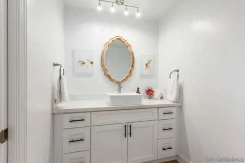 a bedroom with a large bed and a large window