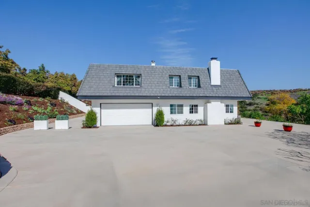 front view of a house with a street