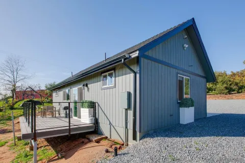 a bathroom with a sink vanity mirror and toilet
