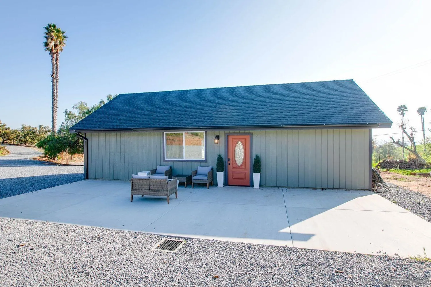 9431 West Lilac Road Escondido, CA 92026 - Photo 47 of 62 a backyard of a house with seating space