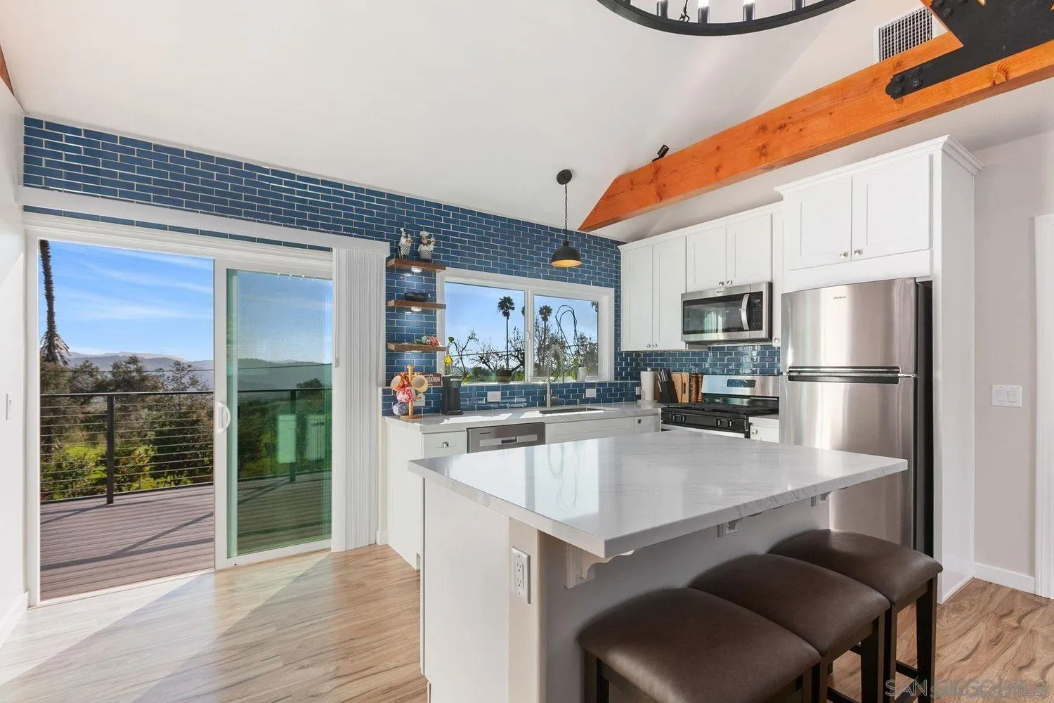 9431 West Lilac Road Escondido, CA 92026 - Photo 49 of 62 a kitchen with a sink cabinets and appliances