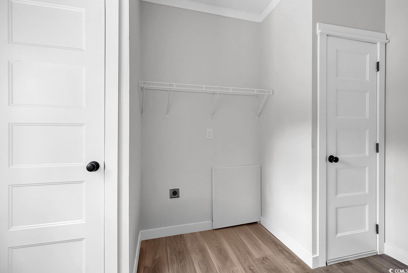 754 Kent Road Andrews, SC 29510 - Photo 31 of 31 Full bathroom featuring a freestanding tub, walk in shower, and wood finished floors