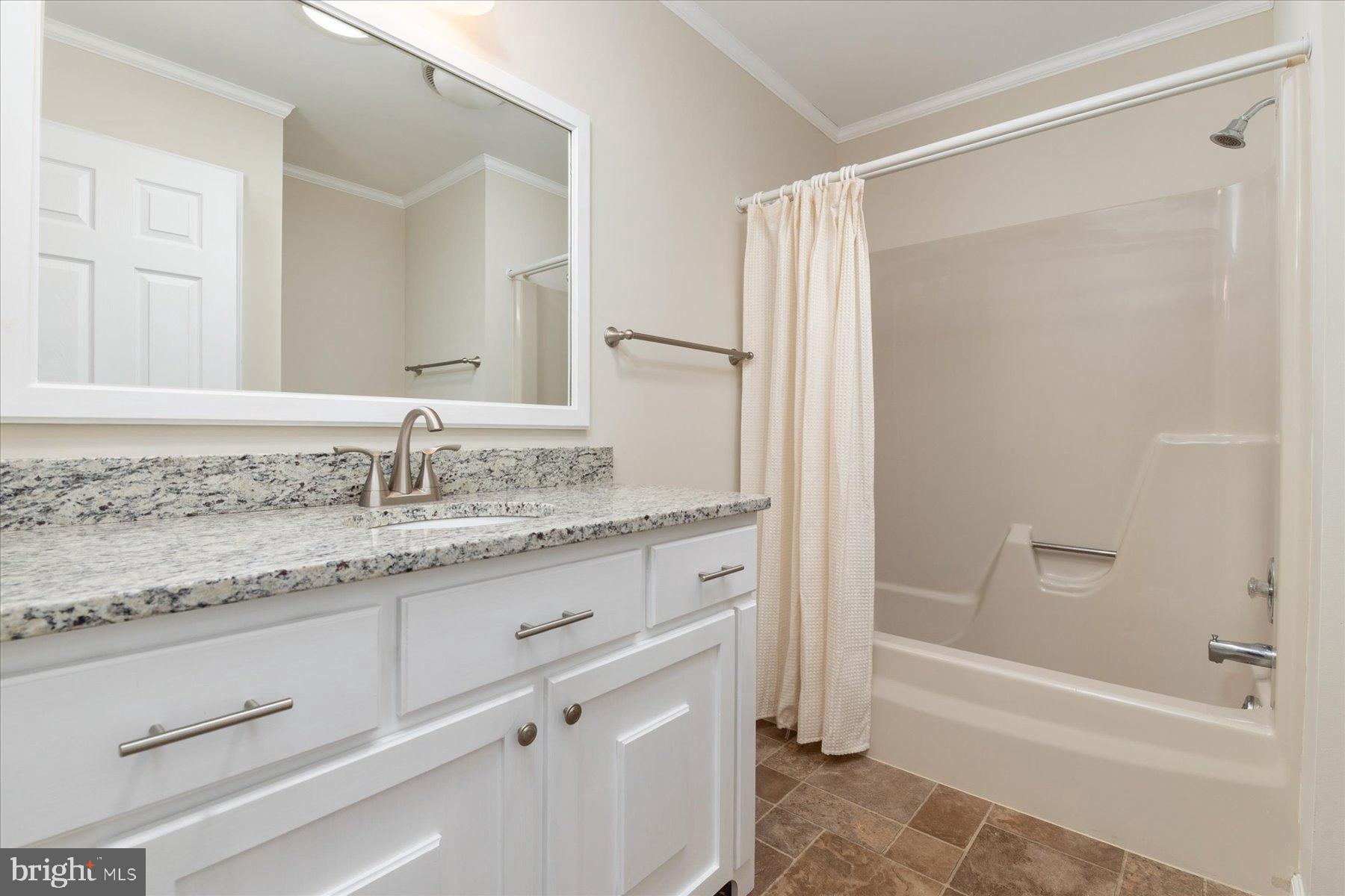 109 Calvert Road Stevensville, MD 21666 - Photo 34 of 41 Modern bathroom with elegant finishes.