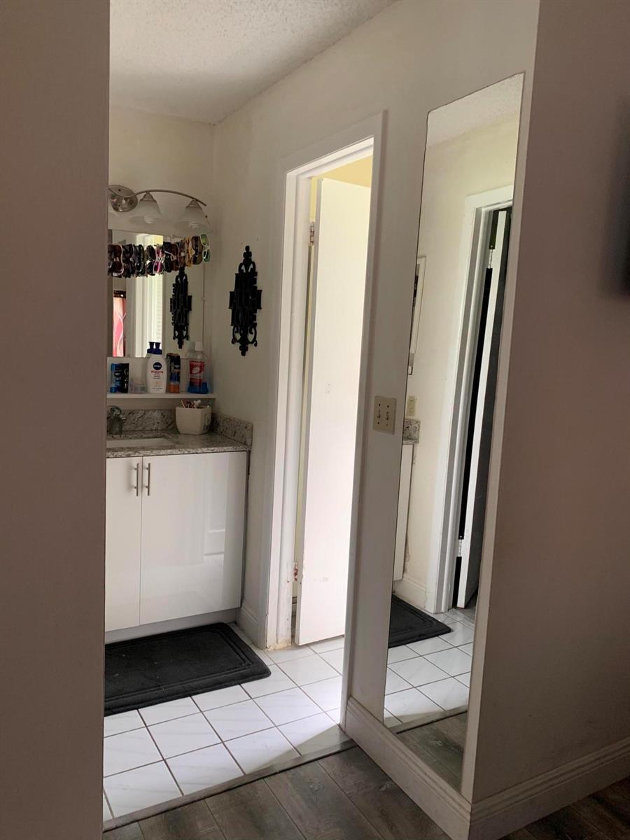 1883 Abbey Road, Unit 22A West Palm Beach, FL 33415 - Photo 14 of 23 B4720D7F-CBFD-4C99-98E1-2E05EE5F5017