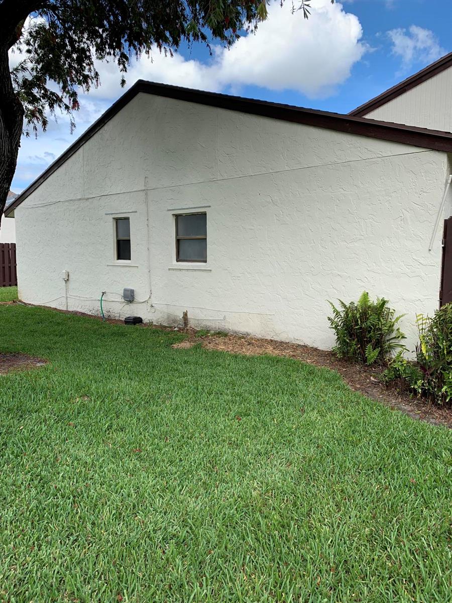 1883 Abbey Road, Unit 22A West Palm Beach, FL 33415 - Photo 3 of 23 AA11ED59-C04D-4D9F-9A60-A4A87DBE00CF