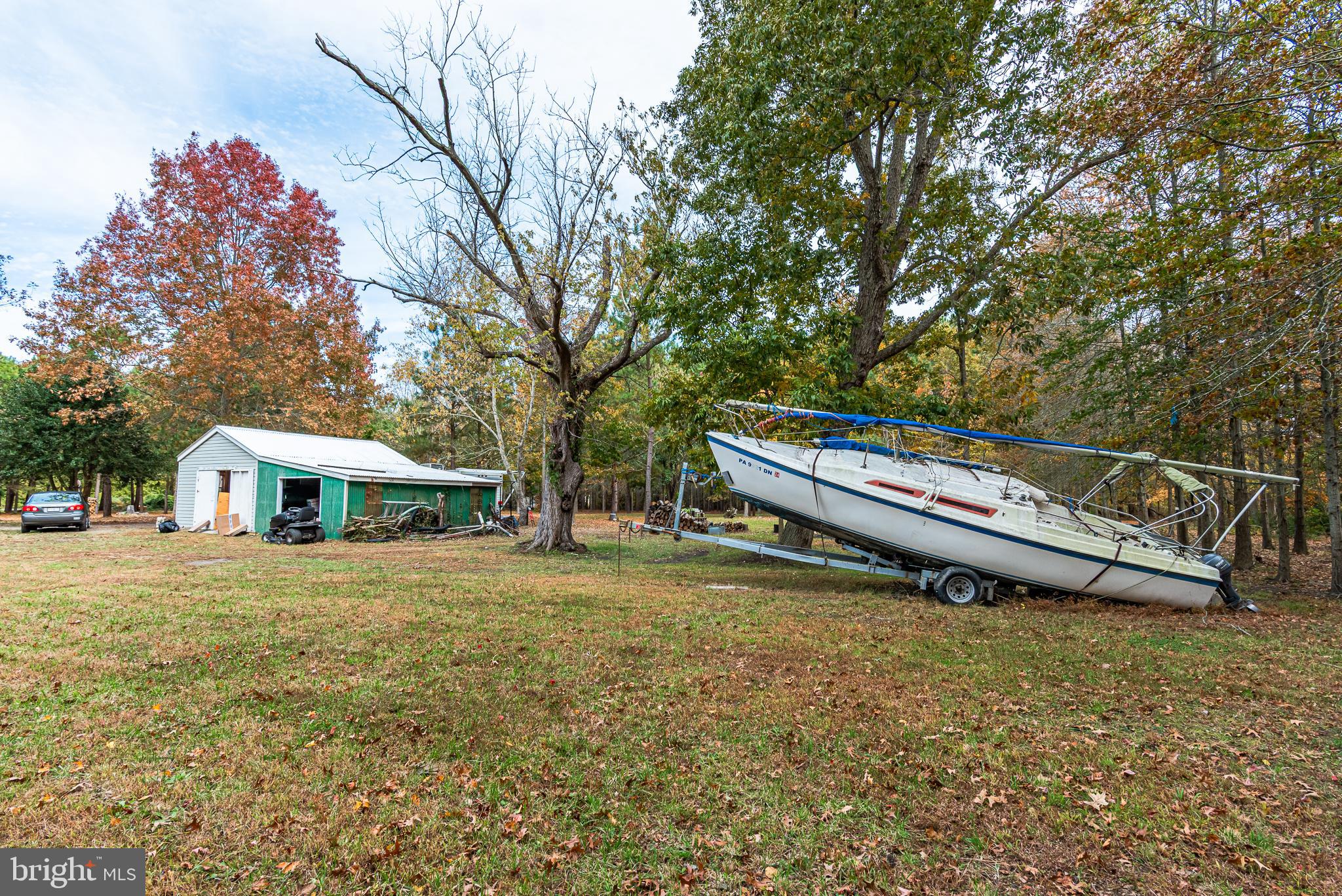 24653 McInturff Road Dames Quarter, MD 21821 - Photo 24 of 62 a backyard of a house with table and chairs