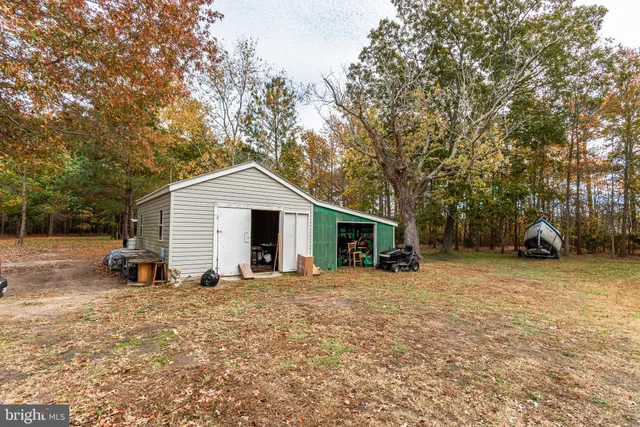 a sign board with a yard