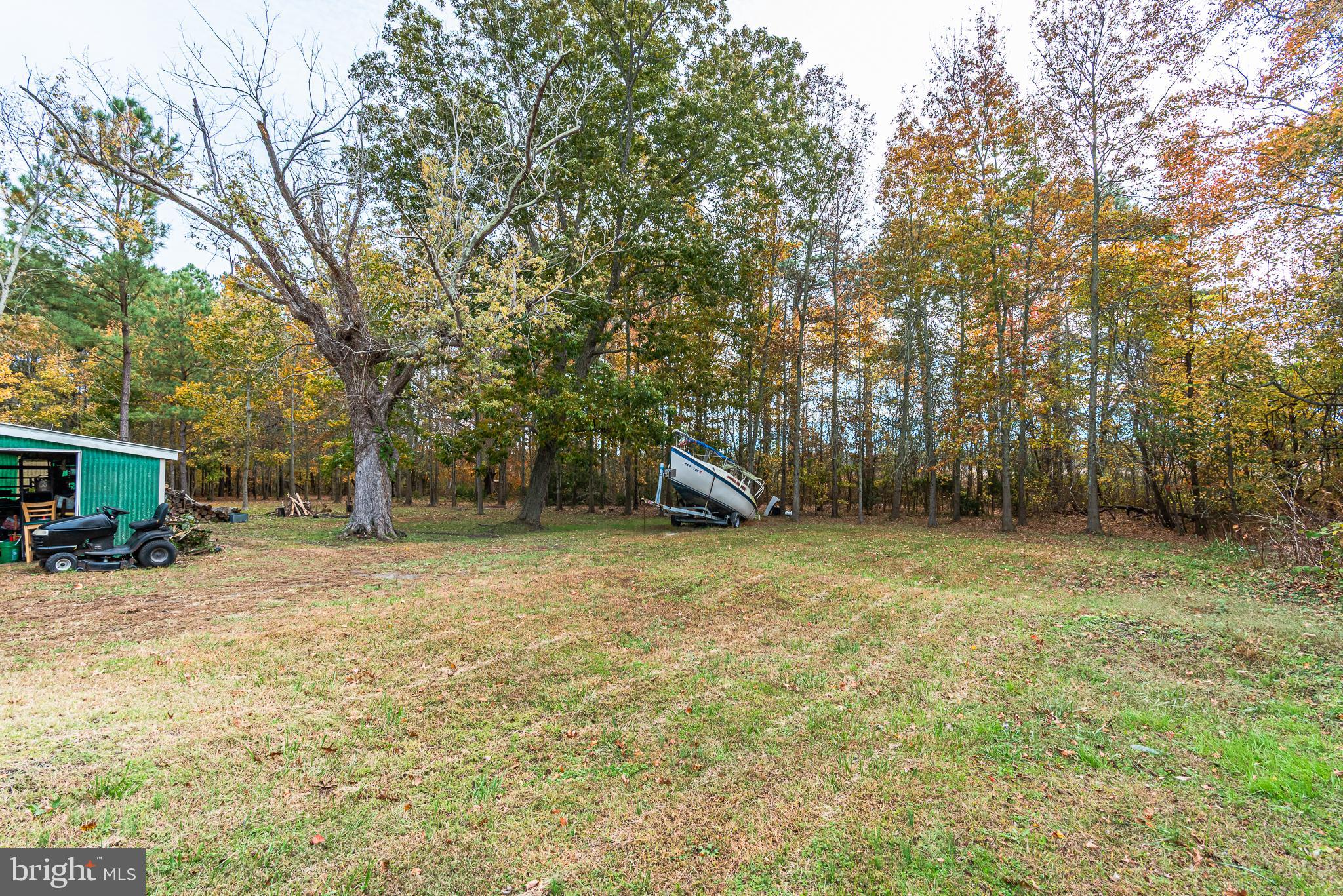 24653 McInturff Road Dames Quarter, MD 21821 - Photo 60 of 62 a backyard of a house with seating space