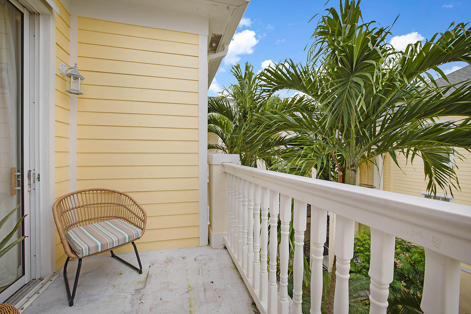 225 Murcia Drive, Unit 313 Jupiter, FL 33458 - Photo 25 of 31 a view of a balcony with a plant