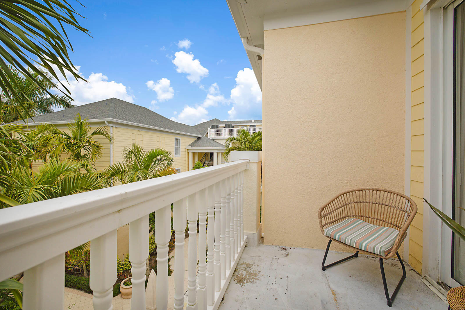 225 Murcia Drive, Unit 313 Jupiter, FL 33458 - Photo 26 of 31 a view of a balcony with an outdoor space