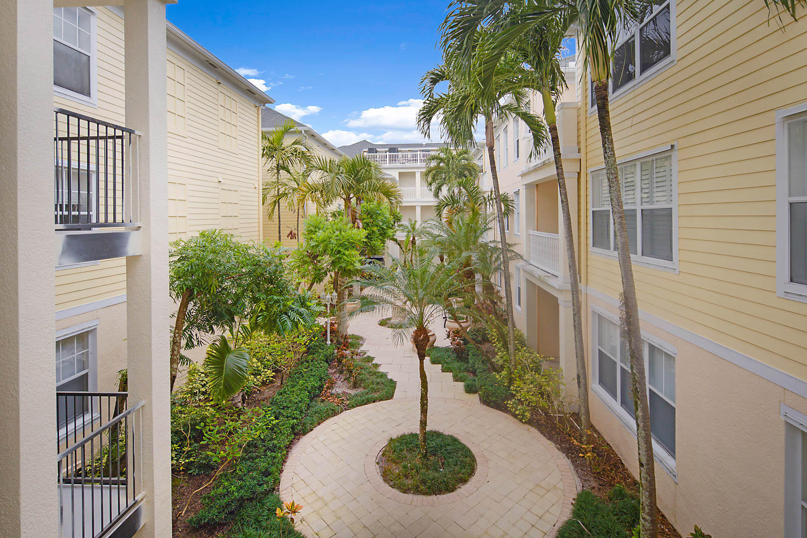 225 Murcia Drive, Unit 313 Jupiter, FL 33458 - Photo 29 of 31 a view of outdoor space and yard