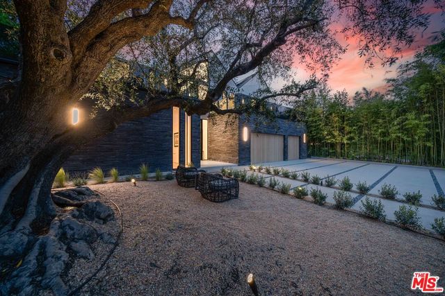 a room with lots of furniture and a painting