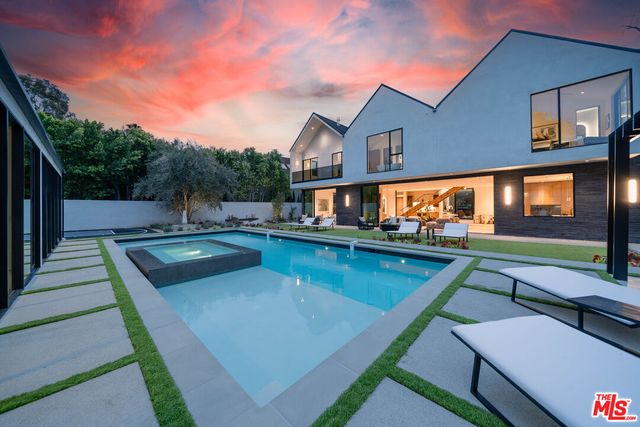 a front view of a house with yard