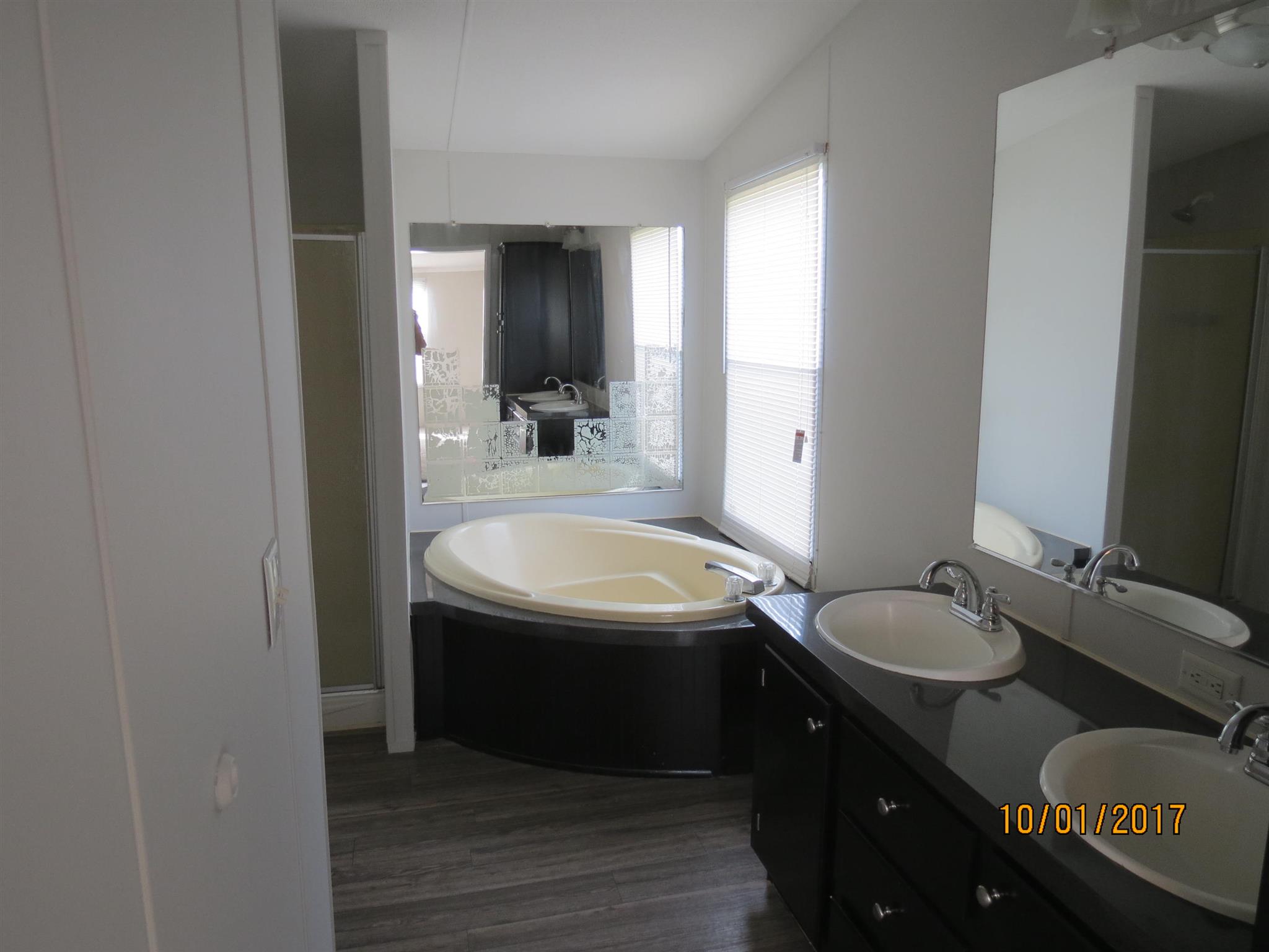 3294 Cedar Grove Road Lebanon, TN 37087 - Photo 13 of 25 a bathroom with a granite countertop sink and a mirror