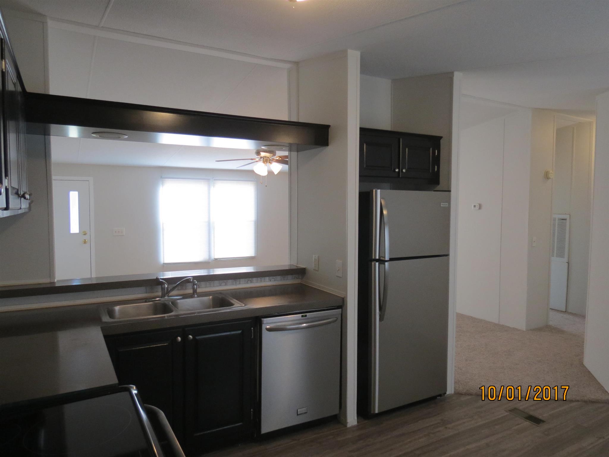 3294 Cedar Grove Road Lebanon, TN 37087 - Photo 8 of 25 a kitchen with a refrigerator and a sink