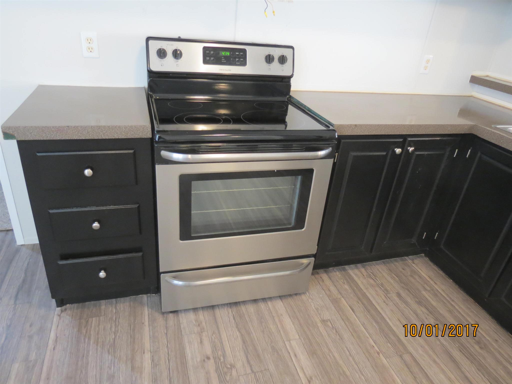 3294 Cedar Grove Road Lebanon, TN 37087 - Photo 9 of 25 a stove top oven sitting inside of a kitchen