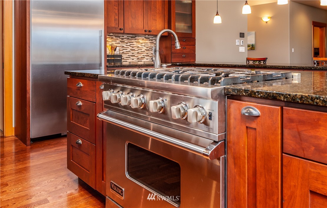 6460 Everson Goshen Road Everson, WA 98247 - Photo 11 of 37 a kitchen with granite countertop a stove and a sink