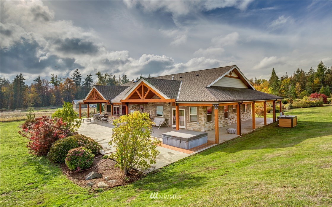 6460 Everson Goshen Road Everson, WA 98247 - Photo 23 of 37 a front view of a house with garden