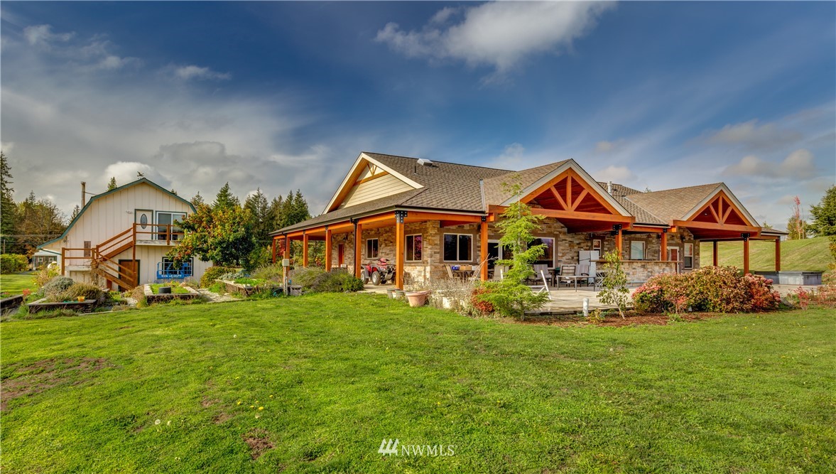 6460 Everson Goshen Road Everson, WA 98247 - Photo 29 of 37 a front view of a house with garden
