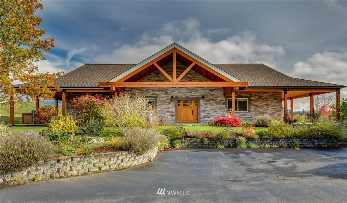 6460 Everson Goshen Road Everson, WA 98247 - Photo 4 of 37 a front view of a house with a yard and garage