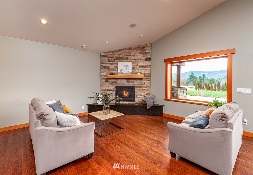 6460 Everson Goshen Road Everson, WA 98247 - Photo 8 of 37 a living room with furniture and a fireplace