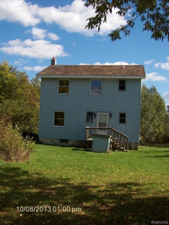 8270 Logana Road Avoca, MI 48006 - Photo 1 of 23 Front