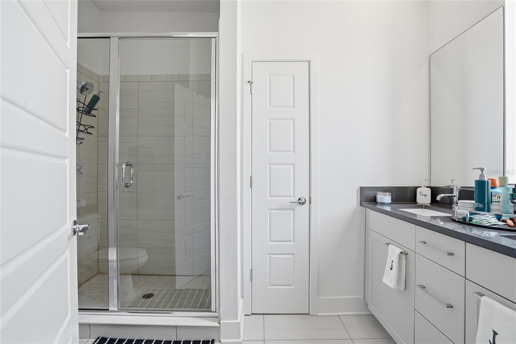 4810 West McElroy Avenue, Unit 30 Tampa, FL 33611 - Photo 27 of 43 a bathroom with a shower and a sink