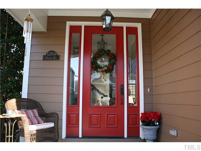 1204 Harp Street Raleigh, NC 27604 - Photo 3 of 25 a view of a red door of the house