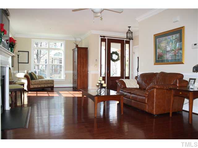 1204 Harp Street Raleigh, NC 27604 - Photo 5 of 25 a living room with furniture and a large window