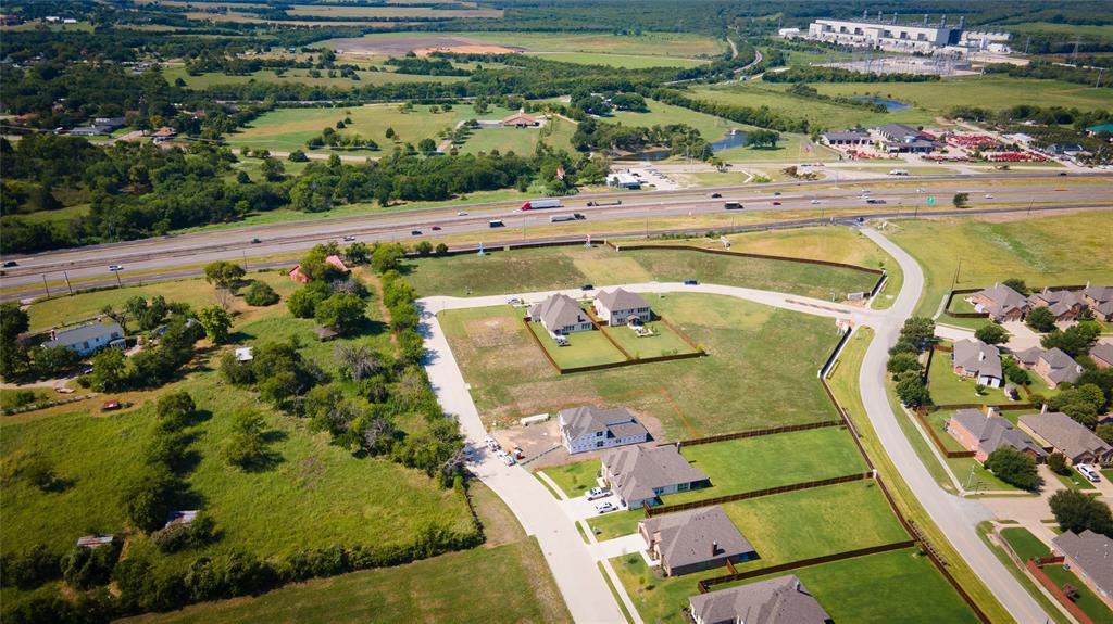 715 Soprano Drive Forney, TX 75126 - Photo 3 of 16 a view of swimming pool with a garden