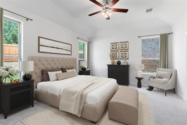 a bedroom with a bed and a night stand