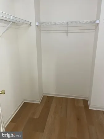 a view of a room with racks on the wall